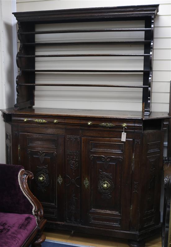 A carved oak dresser W.160cm